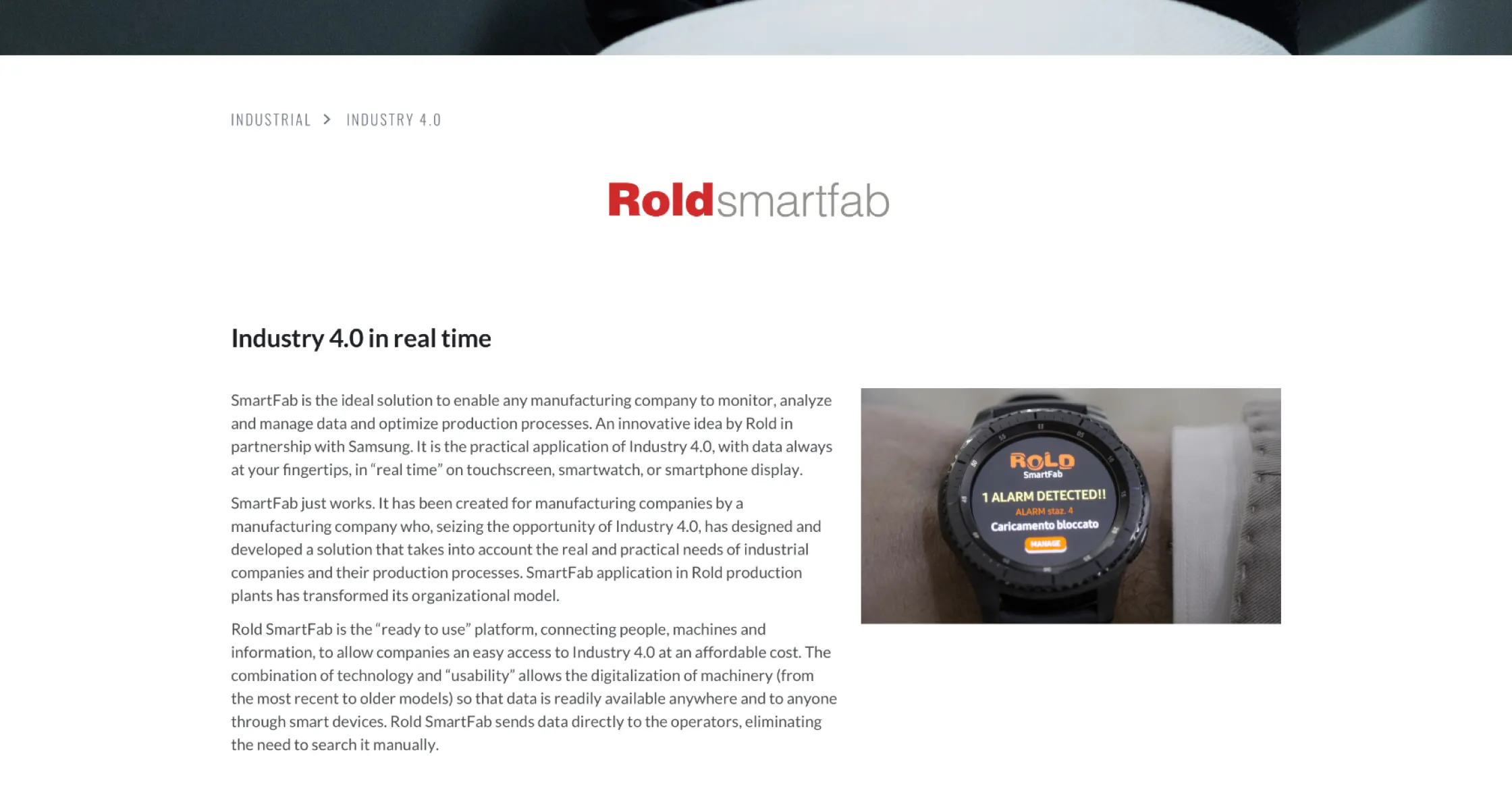 Pagina del sito ROLD dedicata a SmartFab, soluzione Industry 4.0 per il monitoraggio e l’analisi in tempo reale dei dati produttivi. A destra, smartwatch che mostra un allarme rilevato con il messaggio: '1 ALARM DETECTED!! Caricamento bloccato'.